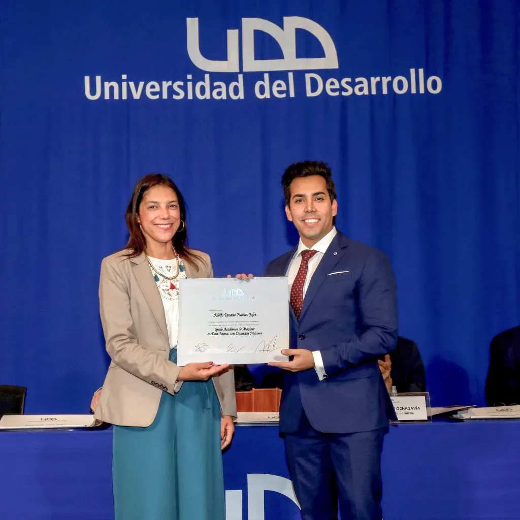 Adolfo Ignacio Fuentes Jofré receiving his Master in Data Science diploma at Universidad del Desarrollo